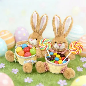 Brown Easter bunny plush holding a woven basket with colorful candies and lollipops