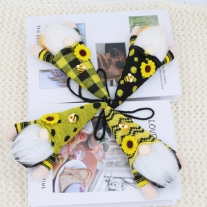 Set of four plush bee festival gnomes with sunflowers and striped hats hanging decor