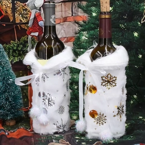 White faux fur Christmas wine bottle covers with silver and gold snowflake embroidery