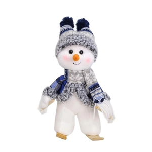 Blue knitted hat snowman plush doll on wooden skis for Christmas holiday decoration