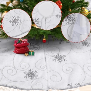 White plush Christmas tree skirt with silver sequin snowflakes and embroidery