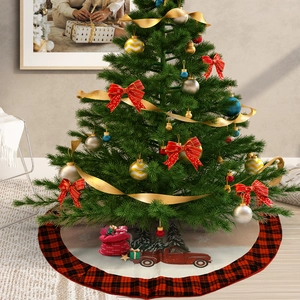 Round Christmas tree skirt with red buffalo plaid edge and vintage red truck print