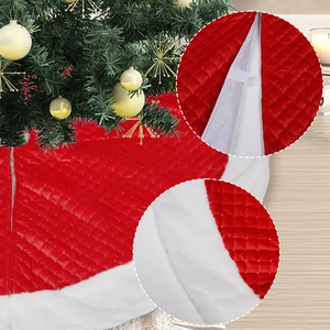 Quilted red Christmas tree skirt with white faux fur trim and velcro closure