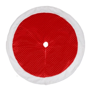 Detail of red quilted Christmas tree skirt with white dots and plush faux fur trim
