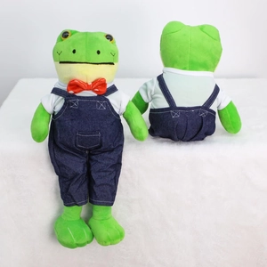 Front and back detail of frog plush in white t-shirt and blue denim overalls