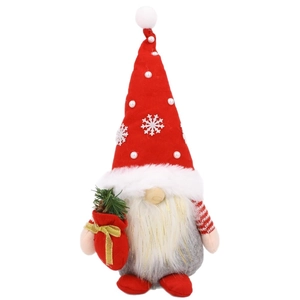 Christmas gnome plush doll with red hat and white beard standing in central view