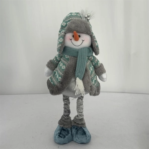 Standing plush snowman Christmas ornament featuring a long-legged design and blue knit outfit