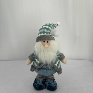 Detail of blue Christmas gnome with a long knitted hat and soft faux fur trim ornaments