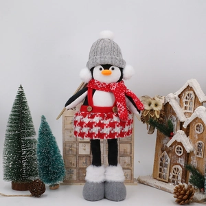 Pinguino di Natale in peluche con gambe allungabili e decorazioni natalizie