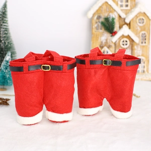Christmas pant shaped gift bags with red felt and white faux fur trim in a festive scene