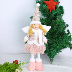 Detail of pink Christmas angel doll with sequin hat and feather skirt for festive decor