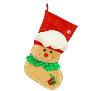 Gingerbread man Christmas stocking with red velvet cuff and festive tree hanging loop