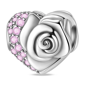 Close-up of heart-shaped charm featuring rose relief and pink cubic zirconia accents