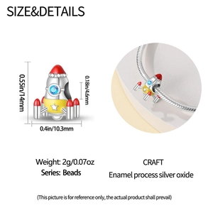 Detail of rocket charm bead in enamel silver with 14mm height and 10.3mm width measurements
