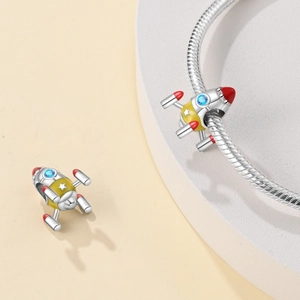 Space rocket charm for DIY bracelets in silver finish with yellow enamel and blue zircon