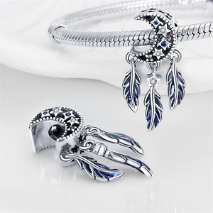 Silver crescent moon dreamcatcher charm with blue enamel feathers on snake chain