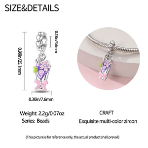 Detailed view showing purple floral charm with pink bow and dimensions of 25.1mm x 7.6mm