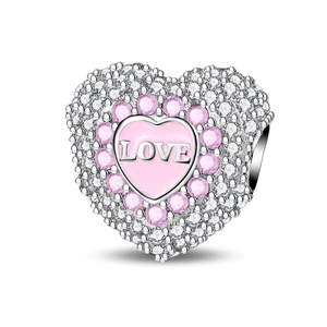 Macro shot of silver heart charm with pink LOVE enamel and sparkling crystal pavé