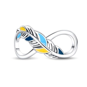 Detail of silver feather ring featuring blue and yellow enamel with infinity symbol