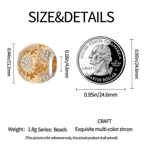 Detailed size comparison of a golden sunflower charm bead with a quarter coin