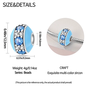 Detail of blue enamel macaron charm with dimensions 12.5mm x 9.3mm on a bracelet