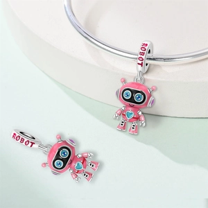 Detail of pink enamel robot charm with blue heart and ROBOT engraving for bracelets