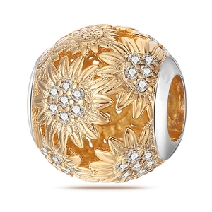 Macro detail of two-tone sunflower charm bead with sparkling cubic zirconia settings