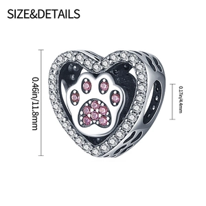 Detailed size specifications for the silver heart charm with pink zircon paw print