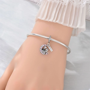 Romantic moon charm bracelet with Jack and Sally figures and pink zircon for weddings