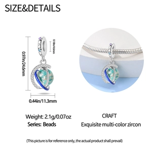 Luminous astronaut planet charm bead with blue enamel orbit and zircon star detail