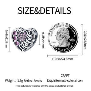 Detailed view of silver heart charm with pink zircon and Love engraving and size comparison
