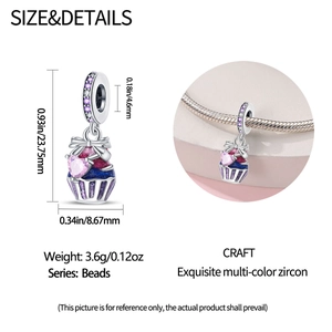 Macro detail of silver cupcake charm with purple zircons and enamel, dimensions 23x8mm