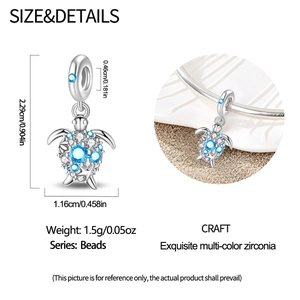 Detailed view of silver sea turtle charm with blue cubic zirconia for DIY bracelets