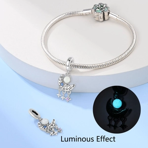 Luminous moon and stars charm with polished silver chain showing glow in the dark effect