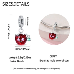 Macro detail of anthropomorphic strawberry charm with dimensions and zircon inlay details