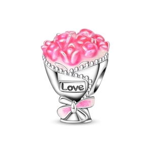 Macro shot of silver bouquet charm with pink enamel roses and Love engraving