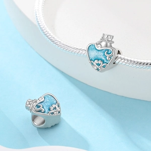 Charm cœur ajouré série océan avec paillettes bleues sur bracelet à chaîne serpent argent