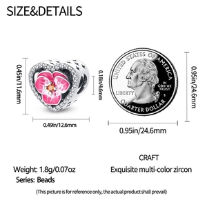 Detailed size comparison of pink pansy flower heart bead with silver coin reference