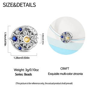 Macro view of sun and moon charm with blue zircons showing detailed size measurements