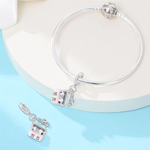 Silver bracelet with earphone case charm and note pendant showing 'We belong' engraving