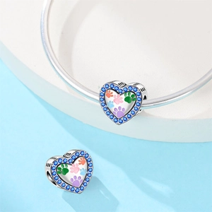 Silver heart charm with blue stones and colorful paw prints on a snake chain
