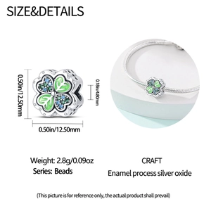 Detailed view of green enamel four-leaf clover charm with measurements and silver finish
