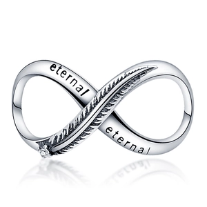 Detail of silver infinity charm with feather accent and eternal engraving