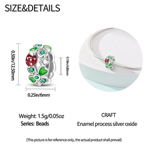 Detail of green enamel flower bead with ladybug on silver bracelet, 12.5mm x 6mm size