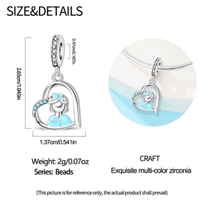 Nurse charm detail with blue enamel and colorful cubic zirconia on silver plating