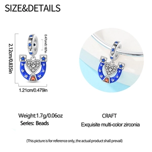 Detail of blue enamel horseshoe charm with measurements and zirconia inlay on bracelet