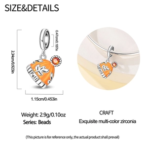 Detail view of fall-themed orange knit hat charm with zircon stone and dimensions