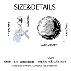 Detail view of silver sun and cross charm bead with dimensions and scale coin