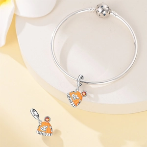 Silver snake chain bracelet with orange enamel pumpkin charms and Fall engraving detail