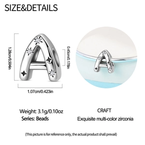 Macro detail of letter A charm bead with stars and zirconia stones for DIY jewelry